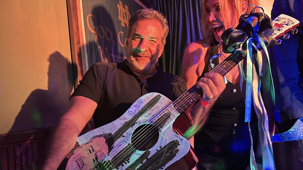Custom painted guitar featuring Rhonda and Mike! Thank you, Allen F.